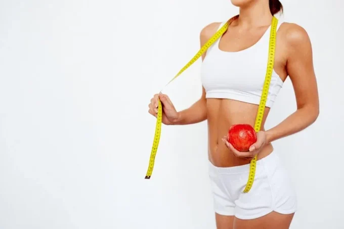 Mujer dieta manzana