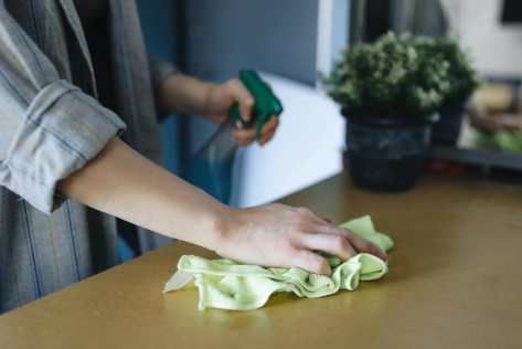 Woman cleaning (Photo credit Pexels)